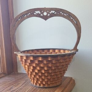 Handcrafted Wooden Basket with Intricate Handle
